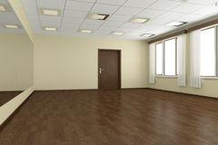 An empty room with wooden floors and white walls.