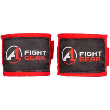 Two red wrist wraps with the words fight gear.
