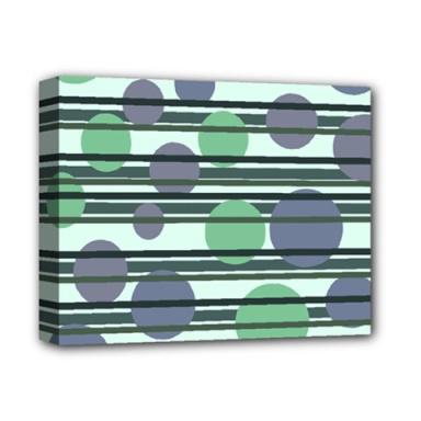 An abstract green and blue polka dot pattern on a canvas