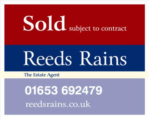 A red and blue business card with the words Reeds Rains.