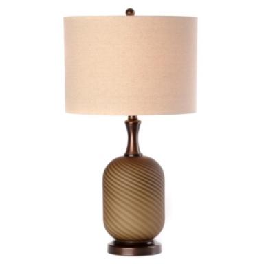 The lamp is brown and has a beige shade.