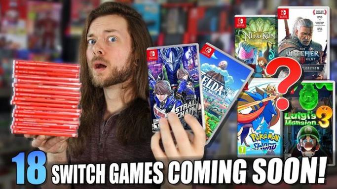 The man is holding two Nintendo games coming soon.
