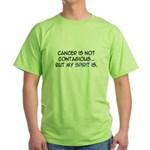 A man wearing a green shirt with the words cancer is not contagous.