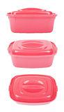 Four pink Tupperware containers with lids.