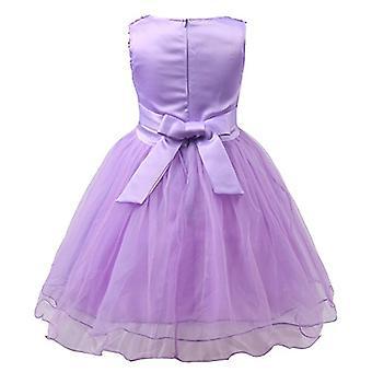 A dress with a purple ribbon and bow.