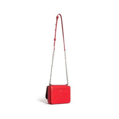 The red purse is on display against a white background.